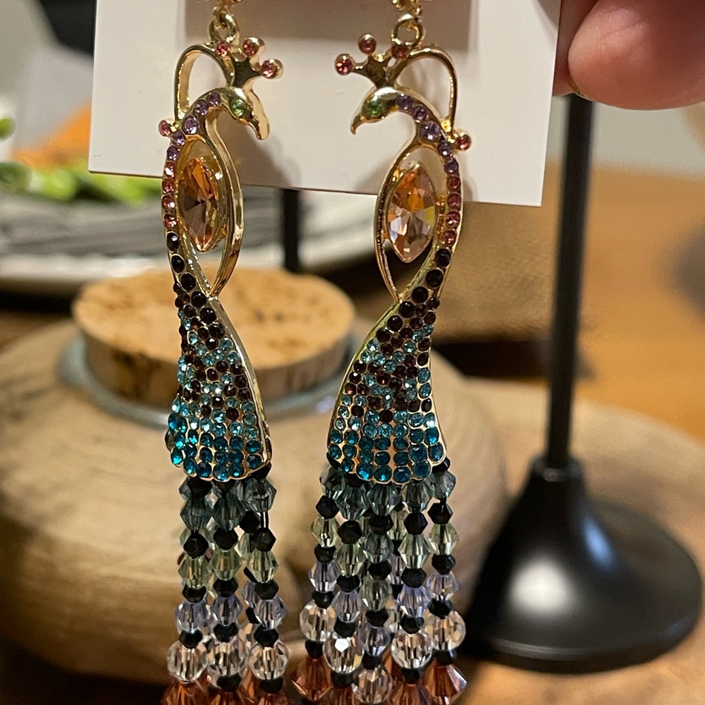 New Betsey Johnson Gold Peacock Earrings. Multicolored blues, green, amber, pink